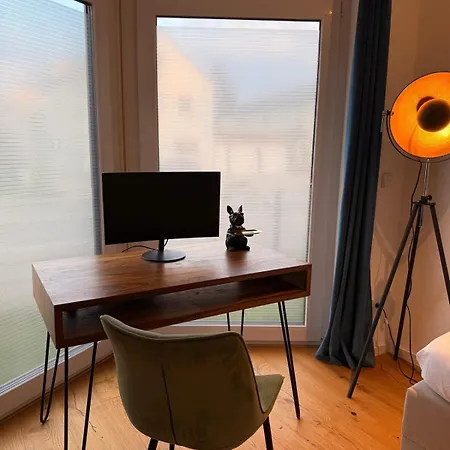 90m2 Loft I Kaffee I Terrasse I E-parkplatz I 65' Smart Tv Apartment