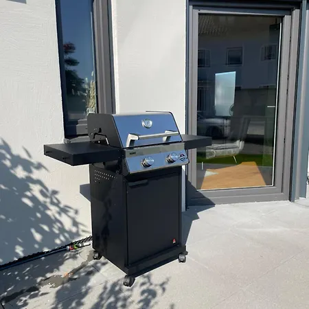 90m2 Loft I Kaffee I Terrasse I E-parkplatz I 65' Smart Tv Apartment *